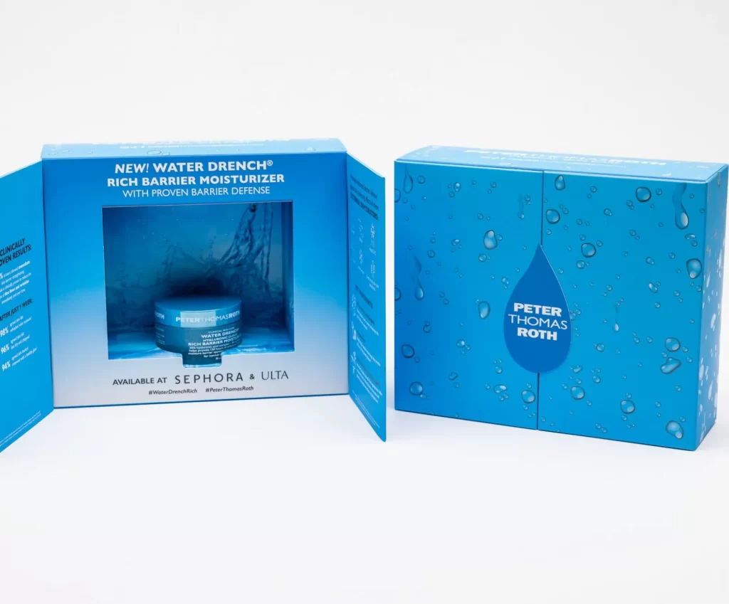 Two blue boxes of Peter Thomas Roth Water Drench Rich Barrier Moisturizer, one closed and one open displaying the jar inside, with water drop graphics and product details.